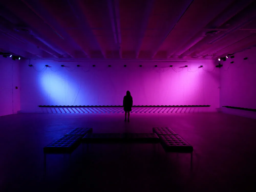 Image of a pink-purple light exhibition. 